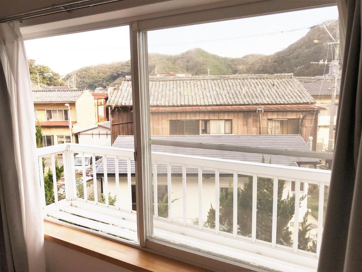 Tsushima White House Acomodação com café da manhã Exterior foto